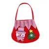 Il sacchetto di caramelle del regalo delle decorazioni di Natale presenta i sacchetti di imballaggio dei supporti del cordoncino di Babbo Natale per l'anno domestico