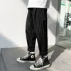 Calças masculinas homens 2023 streetwear homem casual solto japonês homens preto cinza retro xadrez harajuku punk calças coreano listrado harem
