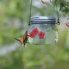 Otros suministros para pájaros Alimentador Portátil para colgar al aire libre Diseño de depósito transparente Flor fluida