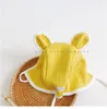 Cappelli Berretto di protezione per le orecchie del bambino del bambino Orso del fumetto Cappello lavorato a maglia caldo invernale Abbigliamento per bambini Accessorio con fiocco in pizzo animale