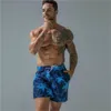 Shorts masculinos praia seca rápida Trenks estampados esportes jovens e lazer de cinco pontos da moda Big Pants 2023