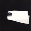 Design de luxe hommes T-shirt dessin animé lettre Graffiti impression col rond manches courtes lâche T-shirt haut décontracté noir blanc