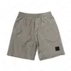 Shorts de plage ostoney konng gonng marque shorts d'été mode masculine en cours d'exécution processus de lavage de tissu à séchage rapide
