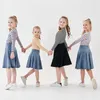 Ensembles de vêtements enfants fille printemps été strechy rayé demi-fermeture éclair t-shirt avec jupes décontractées maman fille mode sportive famille correspondant vêtements 230203