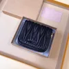 Diseñador de marca Monedero Monedero Clip de dinero de metal Bolso Piel de oveja Plisado Tarjeta para mujer Tarjeta corta de alta belleza Cartera Versátil Moda Cuero Simple Venta directa de fábrica