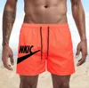 Pantaloncini da uomo estivi Sport Casual Fitness Allenamento traspirante Coulisse Colori caramella Pantaloni da spiaggia maschili larghi Stampa LOGO del marchio