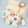 Chave de carro de design de cães Keychain Favor Flower Bag Pingente Pingente Jóia Tecladora de Chaves para homens Presente Fashion PU Correia de animal Corrente de animais