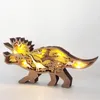 Decorative Objects Figurines Dinosaur Triceratops Decoration Crafts Wooden Hollowed Creative LED Light Desktop Ornaments Christmas Home Decor 230204
