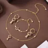 Moda vintage klucz wisiorka naszyjnik projektant łańcucha liter łańcuch bransoletek zestawów biżuterii