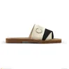 diseñador woody sandalias para mujer mulas zapatillas de tela cruzadas bronceado claro beige blanco negro rosa encaje letras tela zapatillas de lona mujer verano zapatos al aire libre