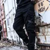 Pantaloni da uomo Casual Cinturino alla caviglia Decor Pantaloni da uomo Tasche lunghe con pattaDa uomo Bert22