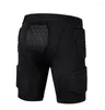 Carpets Sports Protective Reporded Shorts Anti Bupadded Guard avec en nid d'abeille bloque un pantalon court d'entraînement adapté à la peau pour