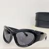 新しいファッションデザインキャットアイサングラススポーツゴーグル0228Sビッグユニボディフレームシンプルで人気のあるスタイルの屋外UV400保護メガネ