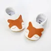 First Walkers Baby Shoes Pu Invlip inlipred ولدوا أحذية رياضية ناعمة وحيد الرسوم المتحركة المشي من 0 إلى 18 شهرًا