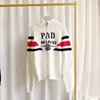 Paris 2022 Höst- och vinterkontrasterande färger Polo krage tröja kvinnors cardigan kort stickrock topp mode lyxdesigner skarvtröja ff stickad