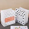 Enrolamento de presentes 50pc Obrigado Sacos plásticos Compras de armazenamento com Handle Christmas Casamento Favor Favor