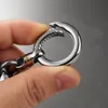 Nyckelringar högklassiga män titanring bil fjärrkontroll special nyckelring högkvalitativ midja hängande nyckelkedja pendantkeychains fier22