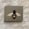 Sacs de portefeuilles courts d'abeille imprimés classiques pour hommes porte-cartes pour dames portefeuilles de clés en cuir véritable pvc pour hommes taille 11x9cm273h