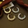Boucles d'oreilles à tige en forme de perle pour femmes, en acier inoxydable, tempérament de luxe, mode alternative, vente en gros, accessoires de bijoux, 2023