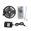 Strisce LED Rgb Strip Light 5050 5M 10M Ip20 LED Nastro nastro flessibile Mini controller Ir Set di adattatori DC12V Luci di consegna a goccia Ligh Dhcsh