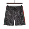 2023 Summer Shorts Dise￱ador de pantalones de playa de lujo Splicio de pantalones cortos Fashion Casual Letter Patchwork Mesh Bajas
