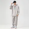 Męskie dresy mody sztrutowe swobodne garnitur Sprężyna i jesienne pullover bluzie bluzki Twopece Set Tracksuit Men Men Jogging Suits 230206