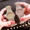 Montres-bracelets grand cadran vente montre de luxe pour femmes cristal Quartz acier inoxydable hommes Imitation diamant Moun22