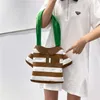 Kvällspåsar tecknad axel för kvinnor 2023 roliga ovanliga söta handväskor randig tryck mode duk strand avslappnad tygväska kvinna