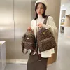 2023 Geldbörsen Ausverkauf Outlet Online-Verkauf Mode neue klassische Schachbrett-Plaid-gedruckte koreanische Tasche Freizeit-Damen-Rucksack aus weichem Leder