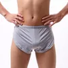 Caleçon Sexy hommes vêtements de nuit ample confortable hommes Boxer course Shorts de sport pyjamas côté fendu sous-vêtements culottes