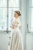 Vintage beige spets a-line bröllopsklänningar viktoriansk stil korsett långa brudklänningar veck med pärlor av remmar från axel brudmottagning slitage plus storlek vestido anpassad