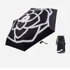 Kamellia trycker femfaldig paraplyer fällbara fickparaply Lätt svart lim Solproof Rain Paraply