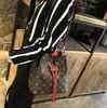 Женщины роскоши дизайнеры сумки с высоким качеством высокие сумочки женские кошельки на плечах пакеты сумки в стиле рюкзак M44022 M44887