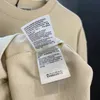 París 2023 Diseñador de lujo Hombres mujeres Camiseta Beige Carta impresa camisas Manga corta Marca de moda Diseñador bb Hombres y mujeres Camiseta Algodón Cuello redondo Top