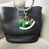 Schaukelpferd-Schlüsselanhänger, Ringe, PU-Leder, Tier-Anhänger, Schlüsselanhänger, Schmuck, Autoschlüssel-Halter, niedliches Cartoon-Mode-Design, Damen-Tasche, hängender Charm-Schlüsselanhänger, Geschenk