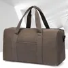 Duffel Bags Мужчины складывают сумасшедшие сумки с большими емкостью Canvas Unisex Luggage Storage Outdoor Prompable Fitness xa858m