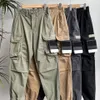 Designer Mens Pant Stone Stones Autunno Inverno cargo Tute Distintivo Stile militare Retro lavato Tasca laterale Fascio Piede uomo Tuta Pantaloni casual FJB7