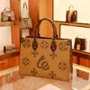 2023 Purses Clearance Outlet Online Sale New Leather Women's Old Color Matching Double-Sided Flower Shopping Portable One Shoulder Large Bag Mommy Tote Bag