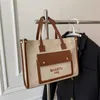 Sac à main en magasin 95% de réduction sur le dédouanement en gros sac en cuir portable de haute qualité pour les femmes 2023 nouveau style Wtern-style polyvalent une épaule Msenger coton et chanvre fourre-tout