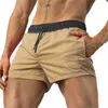 Мужские шорты 2022 Новые летние спортивные штаны Quick Dry, не выкладывая в спорт, легкие эластичные пояс боксеры Fitness Beach Y2302