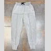 Heren jeans fabriek groothandel splitsen lente en zomer denim 2023 casual broek spirituele man Harlan tiener voeten