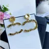 2023 modestil droppe örhänge smidig i 18k guldpläterade silverord form för kvinnor bröllop smycken gåva med låda