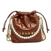 Les sacs de magasin sont vendus à bas prix Fashion Beaded Bucket 2023 Winter New Versatile Women's Crossbody