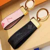 High Quality Keychain Classic Exquisite Designer Car Keyring Cute Brand Fashion Women Men Zinc Alloy Letter Unisex Lanyard Gold Black Metal Accessories 0019