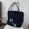 Bolsas de noite Cartas casuais Canvas Mulheres ombro de grande capacidade Bolsa hobos Hobos Lady Bolsas Big Shopper Bolsans Alunos Livros 2023