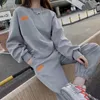 Kvinnors hoodies casual sports kostymer kvinnor Autumn 2023 Fried Street Fashion Sweatshirts Vintage and Tie Feet Sweatpants 2 Piece Sets