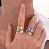 S3410 Modna biżuteria dla kobiet pierścienie Emaliki motylki kwiat otwierający się Pierścień Adustable