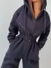 Kobiety Jumpsuits Rompers Hoodie Hooksuit Kobiety Elegancki strój z długim rękawem ciepłe romper żeńskie kieszonkowe kieszonki zamykacze zima 230208