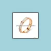 Com pedras laterais tit￢nio a￧o embutido de zirc￣o de zirc￣o anel Ring Wedding noivado de noivado de j￳ias de joalheria entrega de gotas dhj7m
