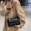 Bolsas de noite de couro Bagute Quilted Modyable for Women Flap Retro Envelope Metal Chain Small ombor Bag